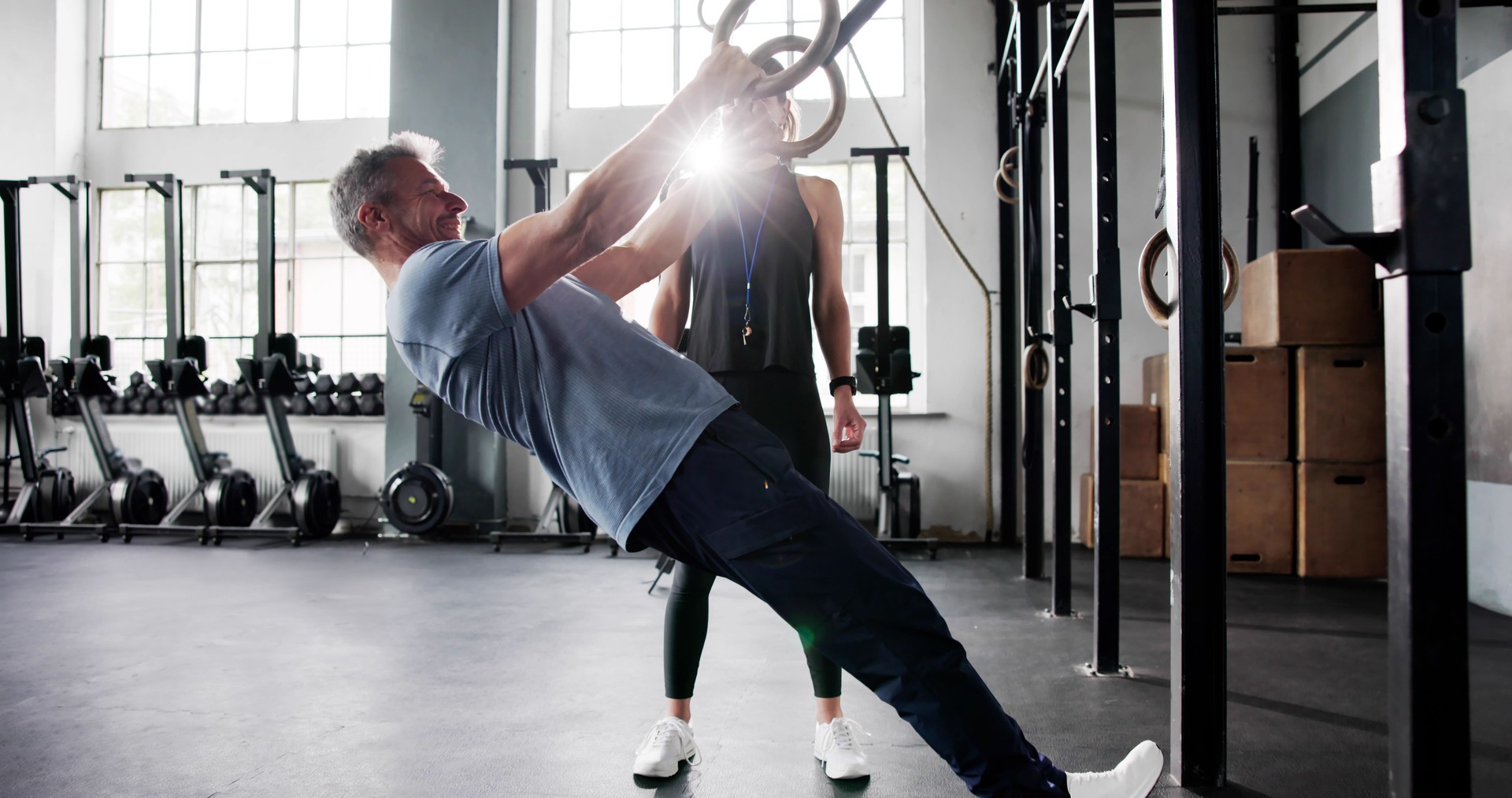Fitness Athlete Doing Calisthenics Training Workout On Rings
